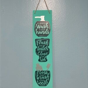 Bathroom hanging sign.